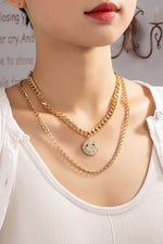 Two necklaces set with cuban chain and smiley face - p3 Boutique